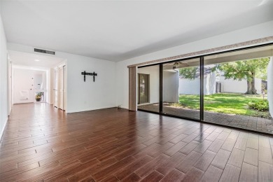 Welcome to this beautifully maintained 3-bedroom, 2-bathroom on Carrollwood Country Club in Florida - for sale on GolfHomes.com, golf home, golf lot