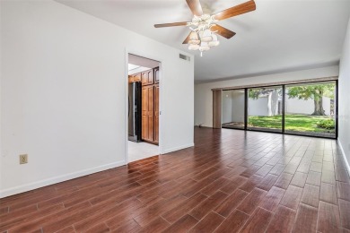 Welcome to this beautifully maintained 3-bedroom, 2-bathroom on Carrollwood Country Club in Florida - for sale on GolfHomes.com, golf home, golf lot