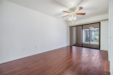 Welcome to this beautifully maintained 3-bedroom, 2-bathroom on Carrollwood Country Club in Florida - for sale on GolfHomes.com, golf home, golf lot
