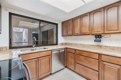 Welcome to this beautifully maintained 3-bedroom, 2-bathroom on Carrollwood Country Club in Florida - for sale on GolfHomes.com, golf home, golf lot