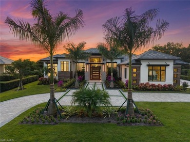 Enjoy tranquil modern elegance within this NEWLY CONSTRUCTED and on Quail West Golf and Country Club in Florida - for sale on GolfHomes.com, golf home, golf lot