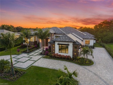Enjoy tranquil modern elegance within this NEWLY CONSTRUCTED and on Quail West Golf and Country Club in Florida - for sale on GolfHomes.com, golf home, golf lot
