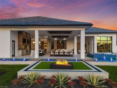 Enjoy tranquil modern elegance within this NEWLY CONSTRUCTED and on Quail West Golf and Country Club in Florida - for sale on GolfHomes.com, golf home, golf lot