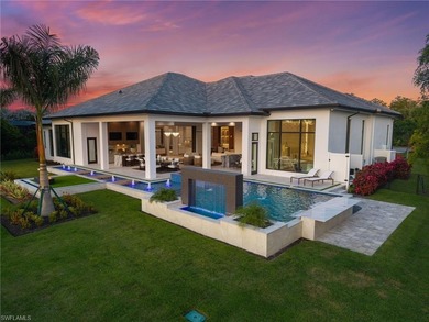 Enjoy tranquil modern elegance within this NEWLY CONSTRUCTED and on Quail West Golf and Country Club in Florida - for sale on GolfHomes.com, golf home, golf lot