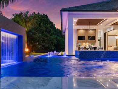 Enjoy tranquil modern elegance within this NEWLY CONSTRUCTED and on Quail West Golf and Country Club in Florida - for sale on GolfHomes.com, golf home, golf lot