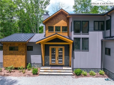 This custom built exquisite mountain modern home is one of a on Elk River Club in North Carolina - for sale on GolfHomes.com, golf home, golf lot