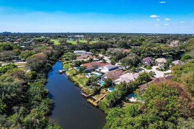 Light and bright pool home nestled in the golf and beach club of on Frenchmans Creek Country Club in Florida - for sale on GolfHomes.com, golf home, golf lot