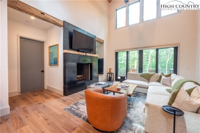 This custom built exquisite mountain modern home is one of a on Elk River Club in North Carolina - for sale on GolfHomes.com, golf home, golf lot