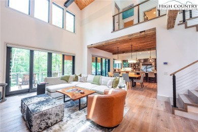 This custom built exquisite mountain modern home is one of a on Elk River Club in North Carolina - for sale on GolfHomes.com, golf home, golf lot