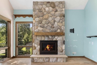 Custom-designed cedar home on over 7.5 acres with 600' of on Bear Lake Highlands Golf Course in Michigan - for sale on GolfHomes.com, golf home, golf lot