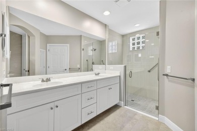 This lovely, first floor end unit coach home shows like new on Pelican Sound Golf and River Club in Florida - for sale on GolfHomes.com, golf home, golf lot