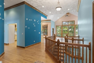 Custom-designed cedar home on over 7.5 acres with 600' of on Bear Lake Highlands Golf Course in Michigan - for sale on GolfHomes.com, golf home, golf lot