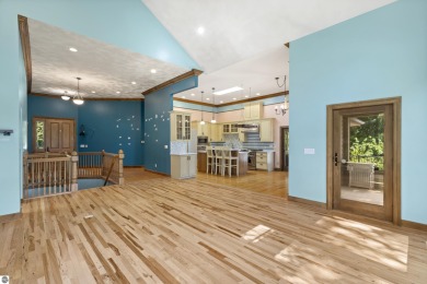 Custom-designed cedar home on over 7.5 acres with 600' of on Bear Lake Highlands Golf Course in Michigan - for sale on GolfHomes.com, golf home, golf lot