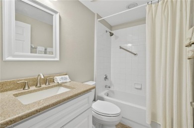This lovely, first floor end unit coach home shows like new on Pelican Sound Golf and River Club in Florida - for sale on GolfHomes.com, golf home, golf lot