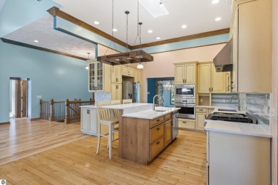Custom-designed cedar home on over 7.5 acres with 600' of on Bear Lake Highlands Golf Course in Michigan - for sale on GolfHomes.com, golf home, golf lot