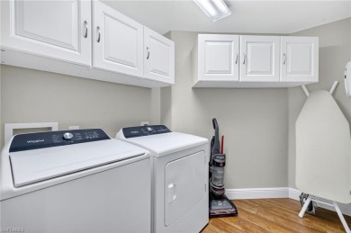 This lovely, first floor end unit coach home shows like new on Pelican Sound Golf and River Club in Florida - for sale on GolfHomes.com, golf home, golf lot