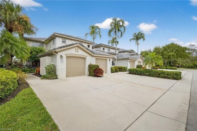 This lovely, first floor end unit coach home shows like new on Pelican Sound Golf and River Club in Florida - for sale on GolfHomes.com, golf home, golf lot