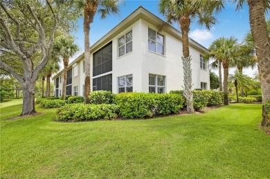 This lovely, first floor end unit coach home shows like new on Pelican Sound Golf and River Club in Florida - for sale on GolfHomes.com, golf home, golf lot