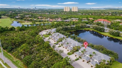 This lovely, first floor end unit coach home shows like new on Pelican Sound Golf and River Club in Florida - for sale on GolfHomes.com, golf home, golf lot