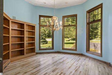 Custom-designed cedar home on over 7.5 acres with 600' of on Bear Lake Highlands Golf Course in Michigan - for sale on GolfHomes.com, golf home, golf lot