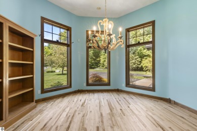 Custom-designed cedar home on over 7.5 acres with 600' of on Bear Lake Highlands Golf Course in Michigan - for sale on GolfHomes.com, golf home, golf lot