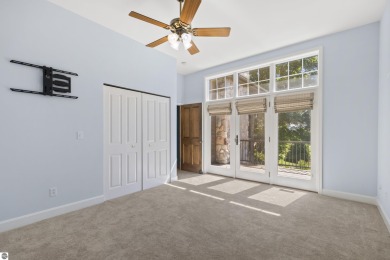 Custom-designed cedar home on over 7.5 acres with 600' of on Bear Lake Highlands Golf Course in Michigan - for sale on GolfHomes.com, golf home, golf lot
