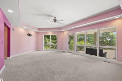 Custom-designed cedar home on over 7.5 acres with 600' of on Bear Lake Highlands Golf Course in Michigan - for sale on GolfHomes.com, golf home, golf lot