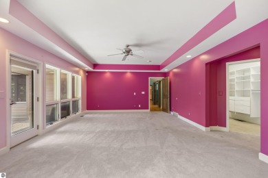 Custom-designed cedar home on over 7.5 acres with 600' of on Bear Lake Highlands Golf Course in Michigan - for sale on GolfHomes.com, golf home, golf lot