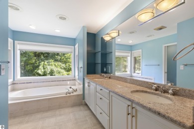 Custom-designed cedar home on over 7.5 acres with 600' of on Bear Lake Highlands Golf Course in Michigan - for sale on GolfHomes.com, golf home, golf lot