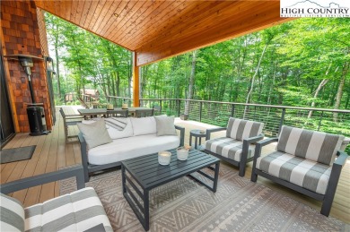 This custom built exquisite mountain modern home is one of a on Elk River Club in North Carolina - for sale on GolfHomes.com, golf home, golf lot