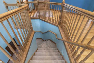 Custom-designed cedar home on over 7.5 acres with 600' of on Bear Lake Highlands Golf Course in Michigan - for sale on GolfHomes.com, golf home, golf lot