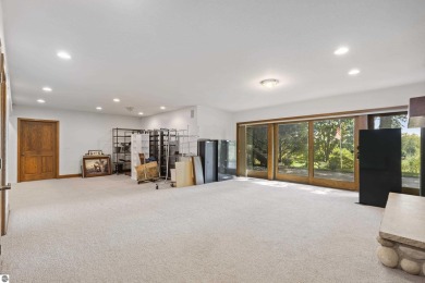 Custom-designed cedar home on over 7.5 acres with 600' of on Bear Lake Highlands Golf Course in Michigan - for sale on GolfHomes.com, golf home, golf lot