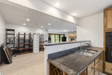 Custom-designed cedar home on over 7.5 acres with 600' of on Bear Lake Highlands Golf Course in Michigan - for sale on GolfHomes.com, golf home, golf lot