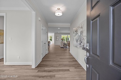 Whether you're seeking a energetic lifestyle or peaceful retreat on Sound Golf Links at Albemarle Plantation in North Carolina - for sale on GolfHomes.com, golf home, golf lot