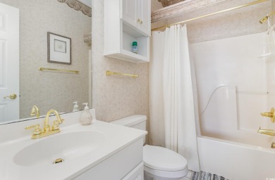 Motivated Seller. This elevator-accessible 2-bedroom, 2-bathroom on Myrtlewood Golf Course and Club  in South Carolina - for sale on GolfHomes.com, golf home, golf lot