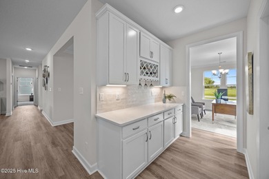 Whether you're seeking a energetic lifestyle or peaceful retreat on Sound Golf Links at Albemarle Plantation in North Carolina - for sale on GolfHomes.com, golf home, golf lot