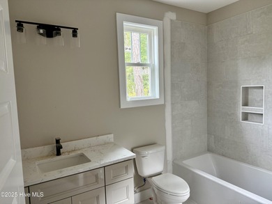 SPECIAL YEAR END SAVINGS from the builder - new price!! Welcome on Magnolia Greens Golf Plantation in North Carolina - for sale on GolfHomes.com, golf home, golf lot