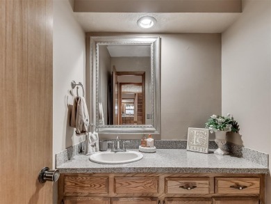 Beautiful and unique Chicago Brick highlights this meticulously on KickingBird Golf Course in Oklahoma - for sale on GolfHomes.com, golf home, golf lot
