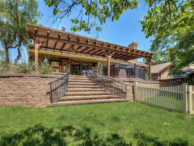 Beautiful and unique Chicago Brick highlights this meticulously on KickingBird Golf Course in Oklahoma - for sale on GolfHomes.com, golf home, golf lot