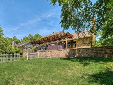 Beautiful and unique Chicago Brick highlights this meticulously on KickingBird Golf Course in Oklahoma - for sale on GolfHomes.com, golf home, golf lot