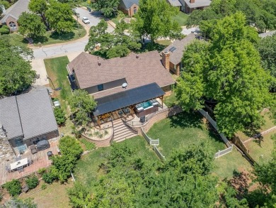 Beautiful and unique Chicago Brick highlights this meticulously on KickingBird Golf Course in Oklahoma - for sale on GolfHomes.com, golf home, golf lot