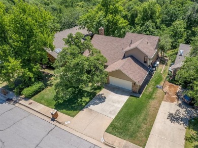 Beautiful and unique Chicago Brick highlights this meticulously on KickingBird Golf Course in Oklahoma - for sale on GolfHomes.com, golf home, golf lot