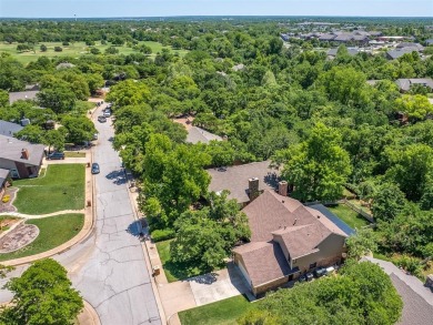 Beautiful and unique Chicago Brick highlights this meticulously on KickingBird Golf Course in Oklahoma - for sale on GolfHomes.com, golf home, golf lot