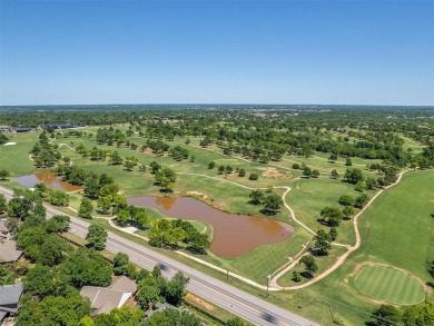 Beautiful and unique Chicago Brick highlights this meticulously on KickingBird Golf Course in Oklahoma - for sale on GolfHomes.com, golf home, golf lot