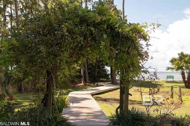 Are you seeking a tranquil escape to build your dream home? Look on Peninsula Golf and Racquet Club in Alabama - for sale on GolfHomes.com, golf home, golf lot