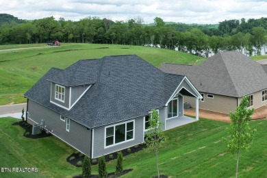 This beautifully appointed Piedmont floor plan includes three on Tennessee National Golf Club in Tennessee - for sale on GolfHomes.com, golf home, golf lot