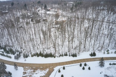 Set on 2.25 wooded acres within the established River Valley on Valleaire Golf Club in Ohio - for sale on GolfHomes.com, golf home, golf lot