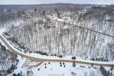 Set on 2.25 wooded acres within the established River Valley on Valleaire Golf Club in Ohio - for sale on GolfHomes.com, golf home, golf lot