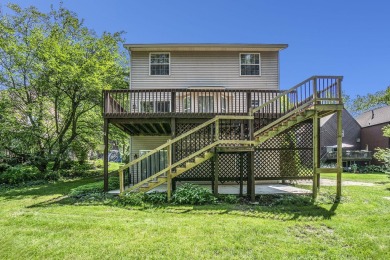 Nestled in the picturesque Lake Doster community This 2 story on Lake Doster Golf Club in Michigan - for sale on GolfHomes.com, golf home, golf lot