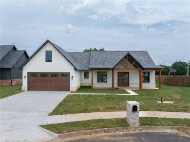 Beautiful new construction in Greenwood's newest and most on Vache-Grasse Country Club in Arkansas - for sale on GolfHomes.com, golf home, golf lot